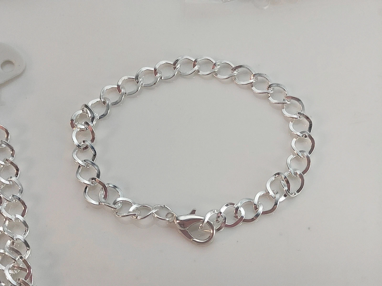 36 verzilverde armbanden met ketting 20cm lot nr. 6585 – photo 5